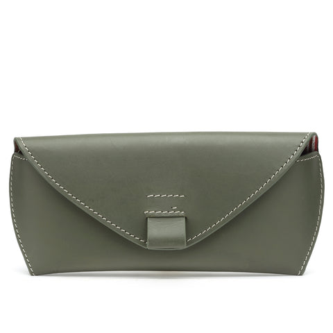 A  olive green leather sunglass case with a  cotton lined interior .